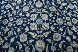 Central medallion detail of 2000s Kashan rug from Iran / Persia