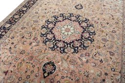 Backside of handmade 2000s Tabriz 50/60/70 Raj rug showing knot structure and weave density