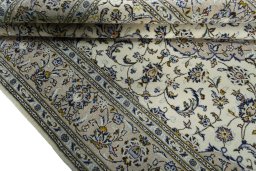 Close-up detail of 2000s Kashan rug from Iran / Persia showing Wool weave