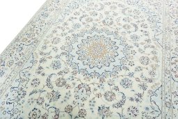 Backside of handmade 2000s Nain rug showing knot structure and weave density