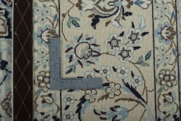 Backside of handmade 2000s Nain rug showing knot structure and weave density