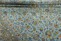 Close-up detail of 2000s Kashan rug from Iran / Persia showing Wool weave