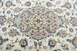 Central medallion detail of 2000s Kashan rug from Iran / Persia