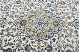 Central medallion detail of 2000s Kashan rug from Iran / Persia
