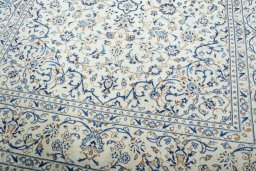 Close-up detail of 2000s Kashan rug from Iran / Persia showing Wool weave