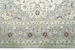 Full view of New Kashan rug from Iran / Persia, 301 × 203 cm in Beige tones