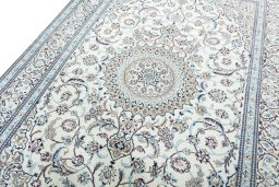 Backside of handmade 2000s Nain rug showing knot structure and weave density