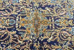 Central medallion detail of 1970s Ghom rug from Iran / Persia