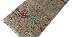 Backside of handmade New Samarkand rug showing knot structure and weave density