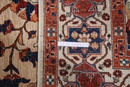 Backside of handmade New Ariana rug showing knot structure and weave density