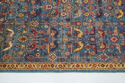Backside of handmade New Ariana rug showing knot structure and weave density