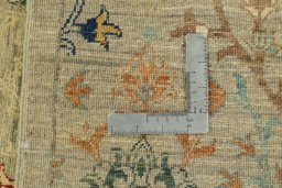 Backside of handmade New Haj-jalili rug showing knot structure and weave density