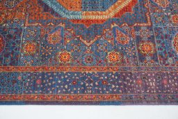 Backside of handmade New Mamluk rug showing knot structure and weave density