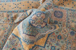 Backside of handmade New Mamluk rug showing knot structure and weave density