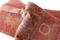 Backside of handmade New Mamluk rug showing knot structure and weave density