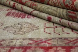 Close-up detail of 1950s Antique Carpets rug from Uzbekistan showing Wool weave