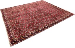 Corner detail of 1950s Samarkand rug showing border pattern and Wool pile