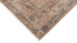 Backside of handmade 1910s Antique Carpets rug showing knot structure and weave density