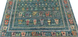 Surface texture of New Samarkand rug with natural Wool and intricate pattern