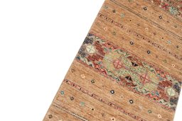 Backside of handmade New Samarkand rug showing knot structure and weave density