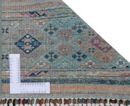 Corner detail of New Samarkand rug showing border pattern and Wool pile