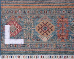 Corner detail of New Samarkand rug showing border pattern and Wool pile