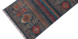 Backside of handmade New Samarkand rug showing knot structure and weave density