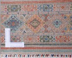 Corner detail of New Samarkand rug showing border pattern and Wool pile