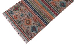 Backside of handmade New Samarkand rug showing knot structure and weave density