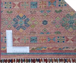 Corner detail of New Samarkand rug showing border pattern and Wool pile