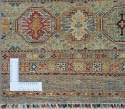 Corner detail of New Samarkand rug showing border pattern and Wool pile