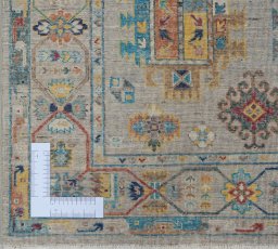 Corner detail of New Samarkand rug showing border pattern and Wool pile