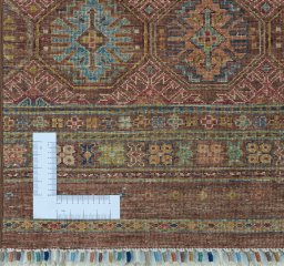 Corner detail of New Samarkand rug showing border pattern and Wool pile