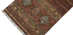 Backside of handmade New Samarkand rug showing knot structure and weave density