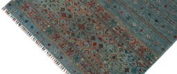 Backside of handmade New Samarkand rug showing knot structure and weave density