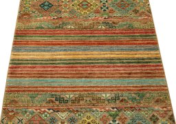 Backside of handmade New Samarkand rug showing knot structure and weave density