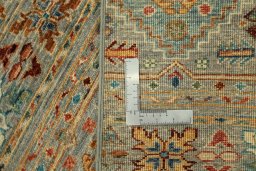 Corner detail of New Samarkand rug showing border pattern and Wool pile