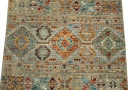 Backside of handmade New Samarkand rug showing knot structure and weave density