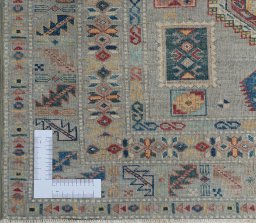 Corner detail of New Kazak rug showing border pattern and Wool pile