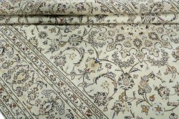 Close-up detail of 2000s Kashan rug from Iran / Persia showing Wool weave