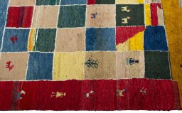 Close-up detail of 2000s Persian Gabbeh rug from Pakistan showing Wool weave