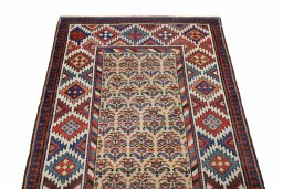 Surface texture of 1900s Antique Carpets rug with natural Wool and intricate pattern