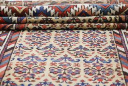 Close-up detail of 1900s Antique Carpets rug from Iran / Persia showing Wool weave
