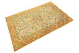 Corner detail of 1920s Antique Carpets rug showing border pattern and Wool pile