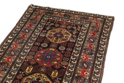 Surface texture of 1900s Antique Carpets rug with natural Wool and intricate pattern