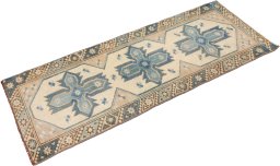 Corner detail of 1920s Antique Carpets rug showing border pattern and Wool pile