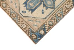 Backside of handmade 1920s Antique Carpets rug showing knot structure and weave density