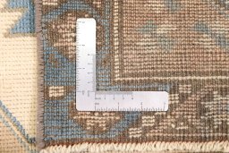 Full view of 1920s Antique Carpets rug from Turkey, 155 × 60 cm in Cream tones