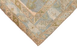 Backside of handmade 1920s Antique Carpets rug showing knot structure and weave density