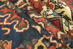 Close-up detail of 1870s Antique Carpets rug from Iran / Persia showing Wool weave